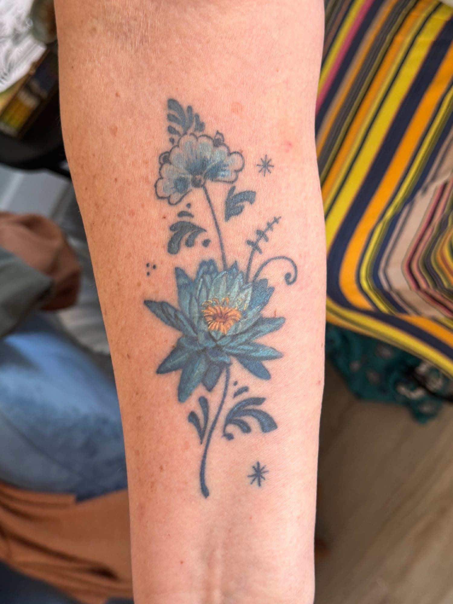 Delft Blue realism tattoo, floral realism
