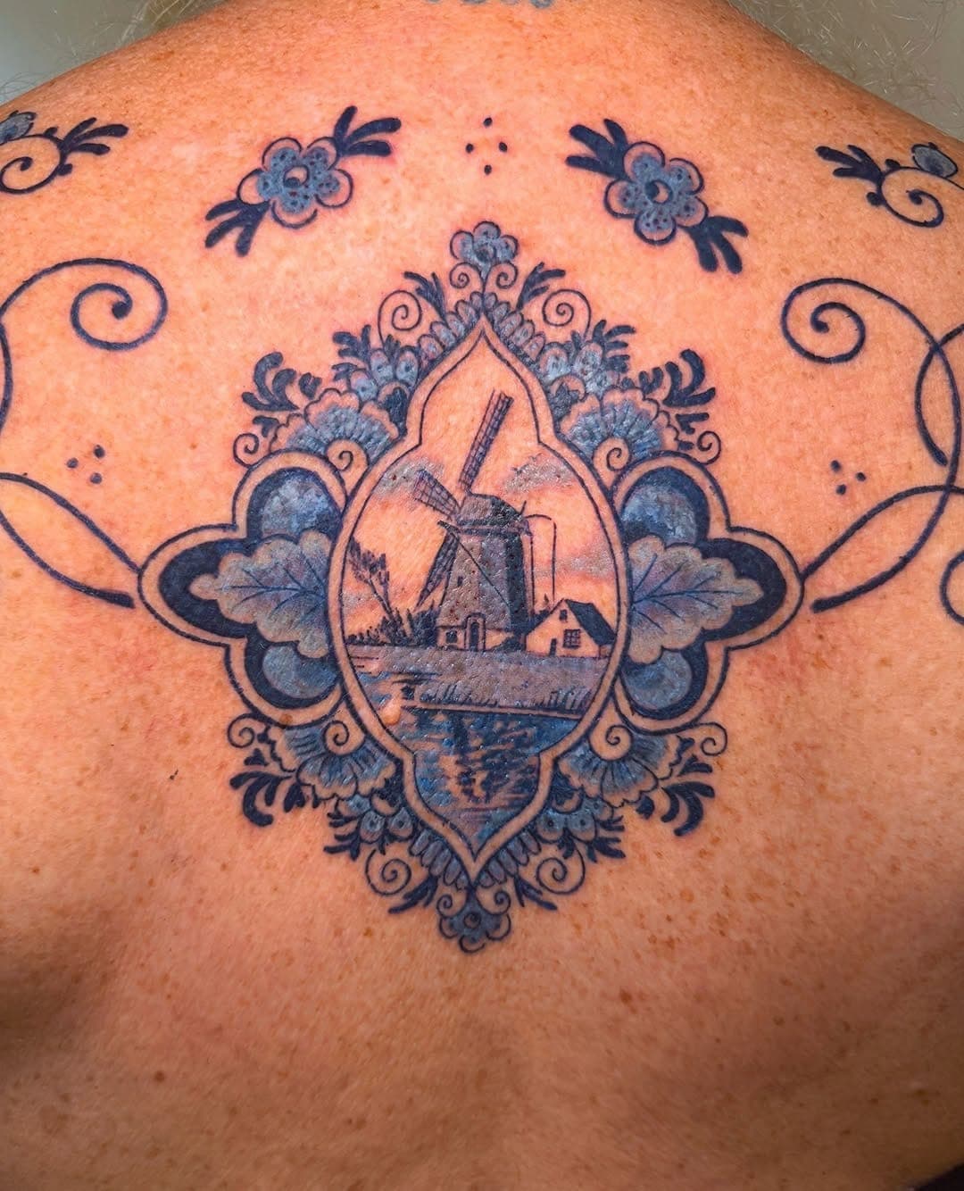 Delft Blue realism tattoo, ornamental back realism