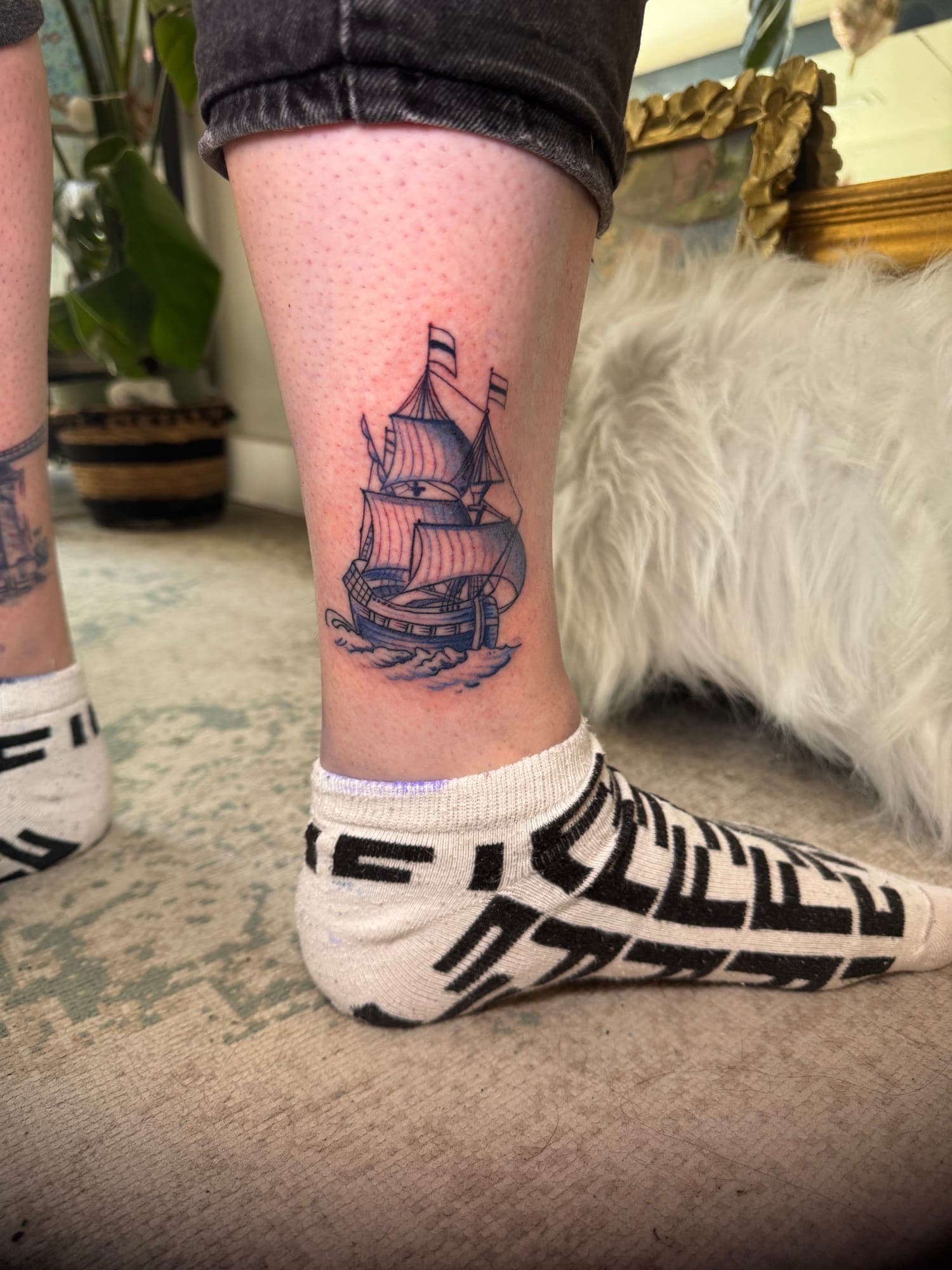 Delft Blue realism tattoo, sailing ship calf
