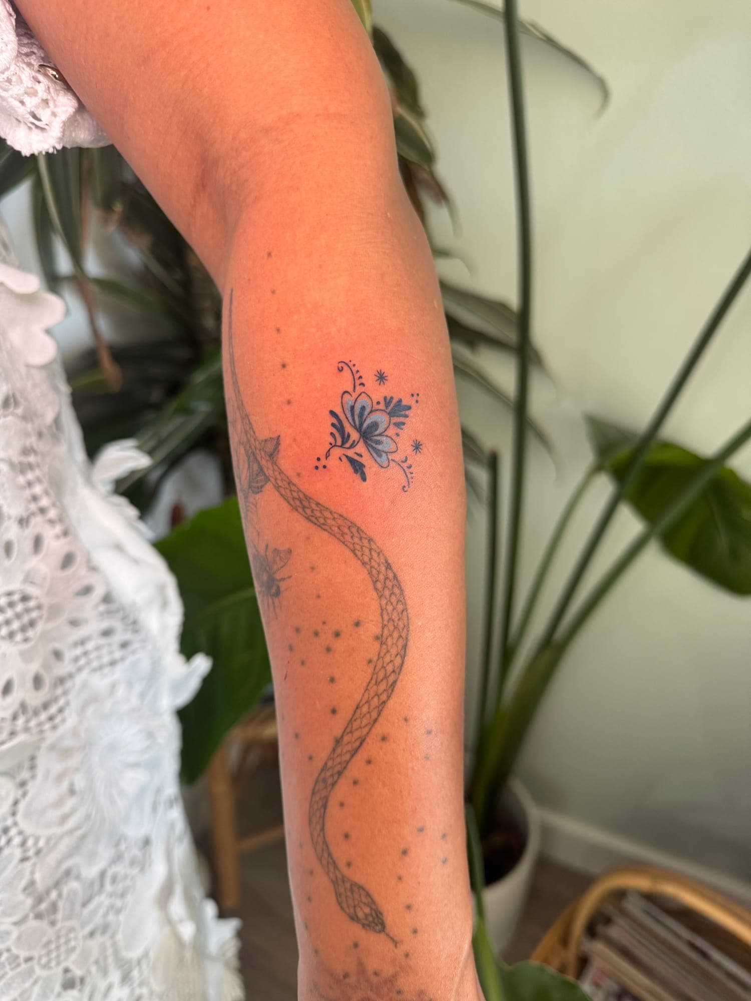 Delft Blue tattoo, botanical forearm
