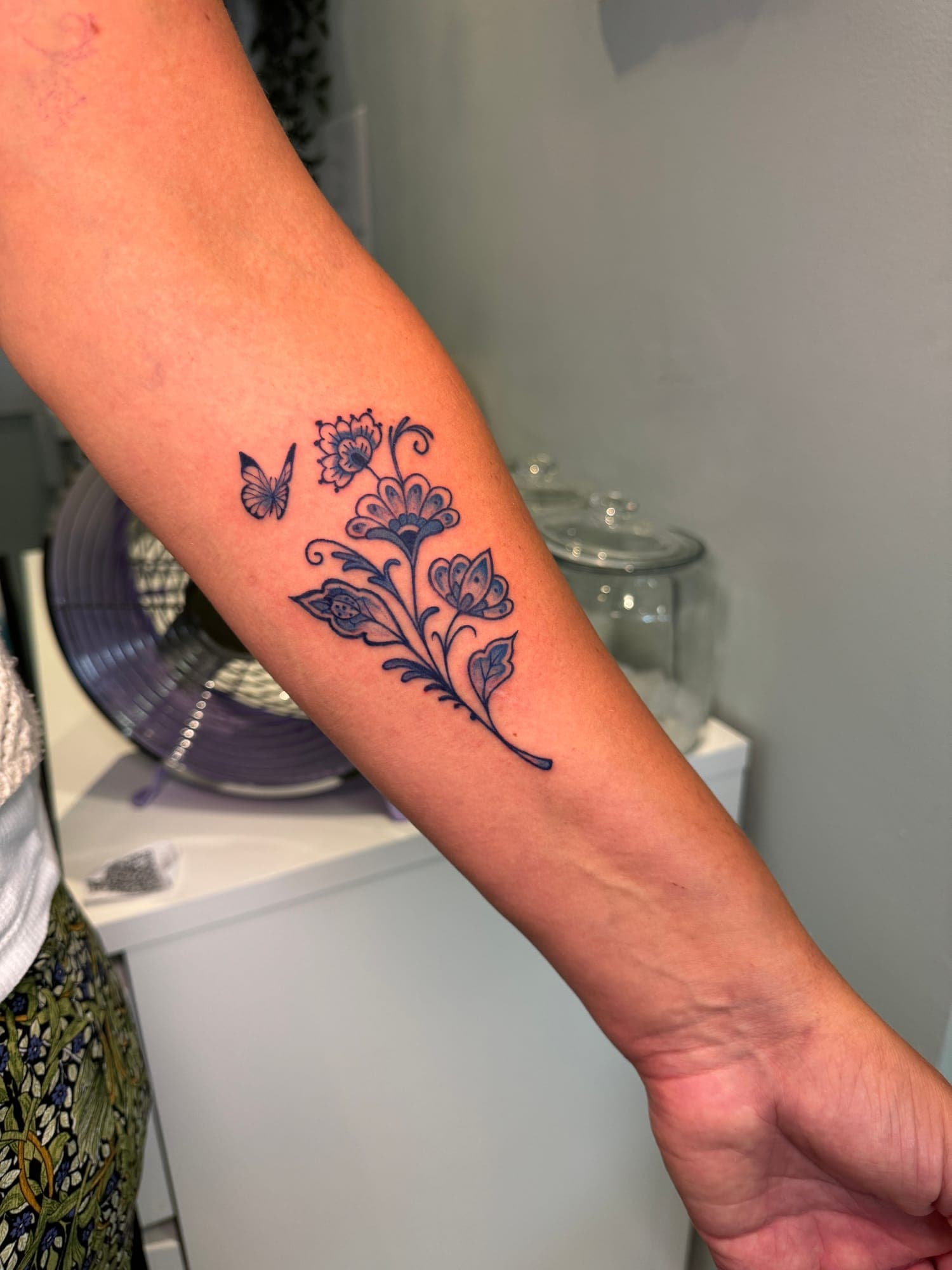 Delft Blue tattoo, floral ornament forearm