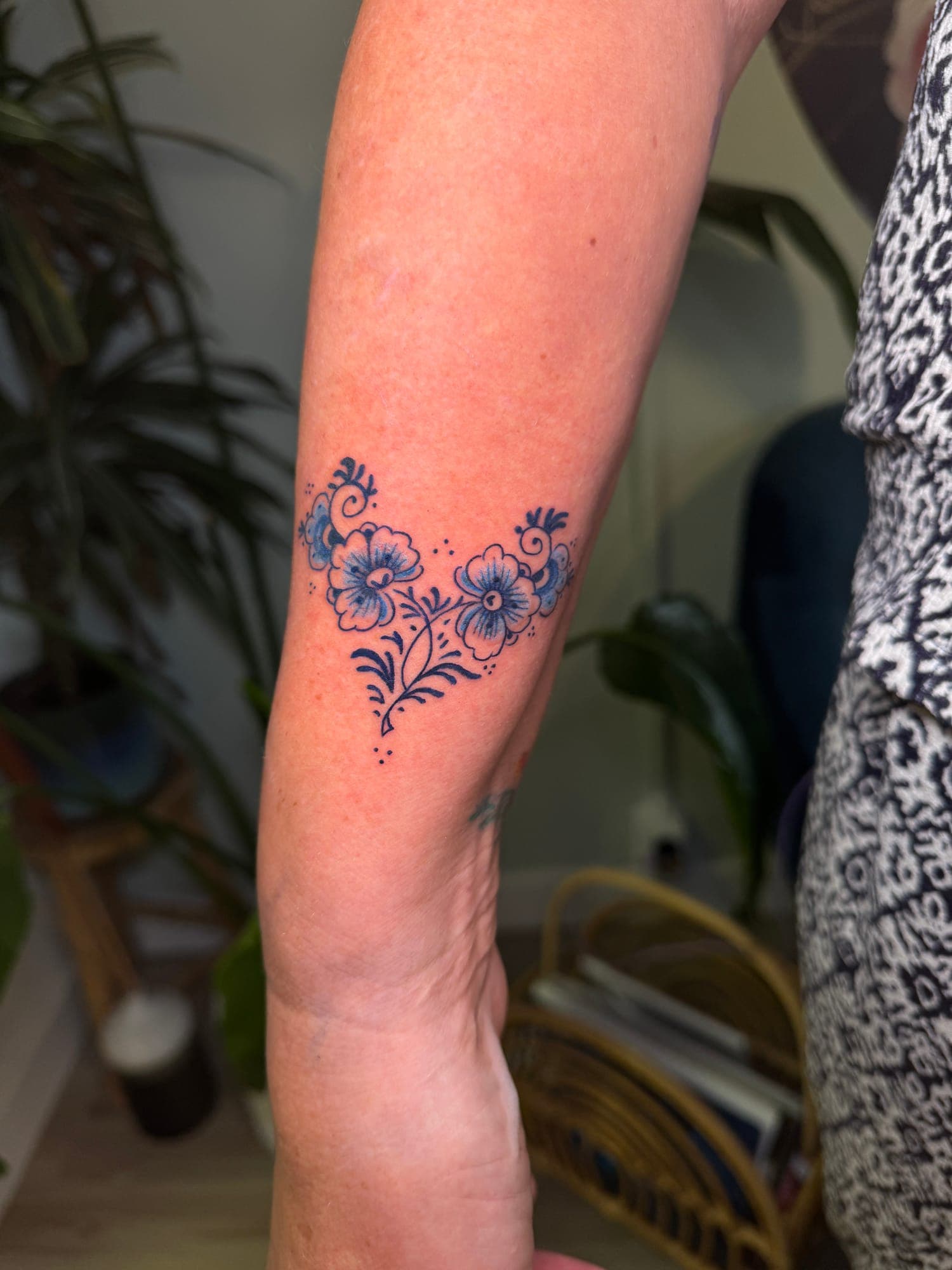 Delft Blue tattoo, floral ornament forearm