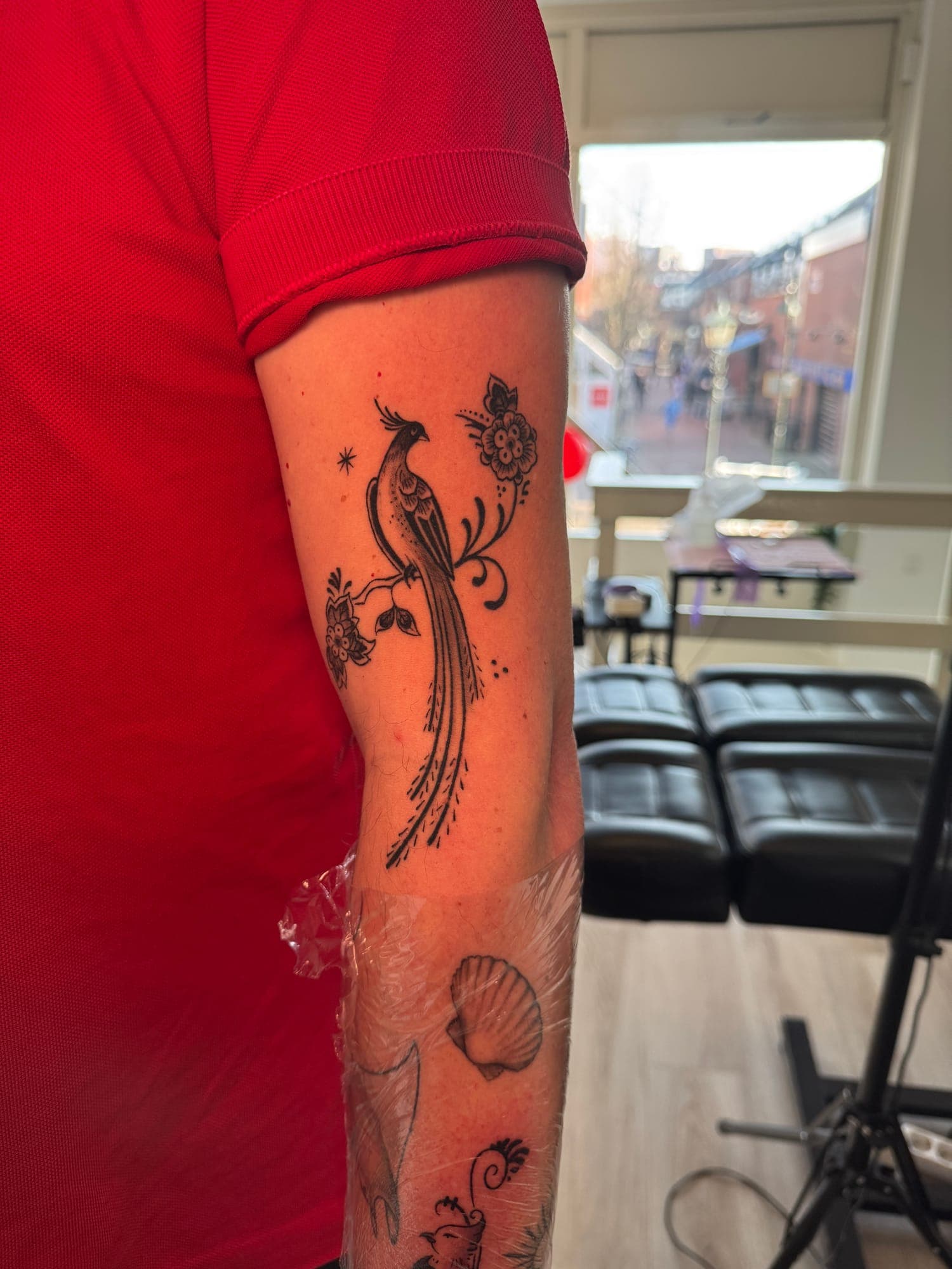 Healed Delft Blue tattoo, botanical leg