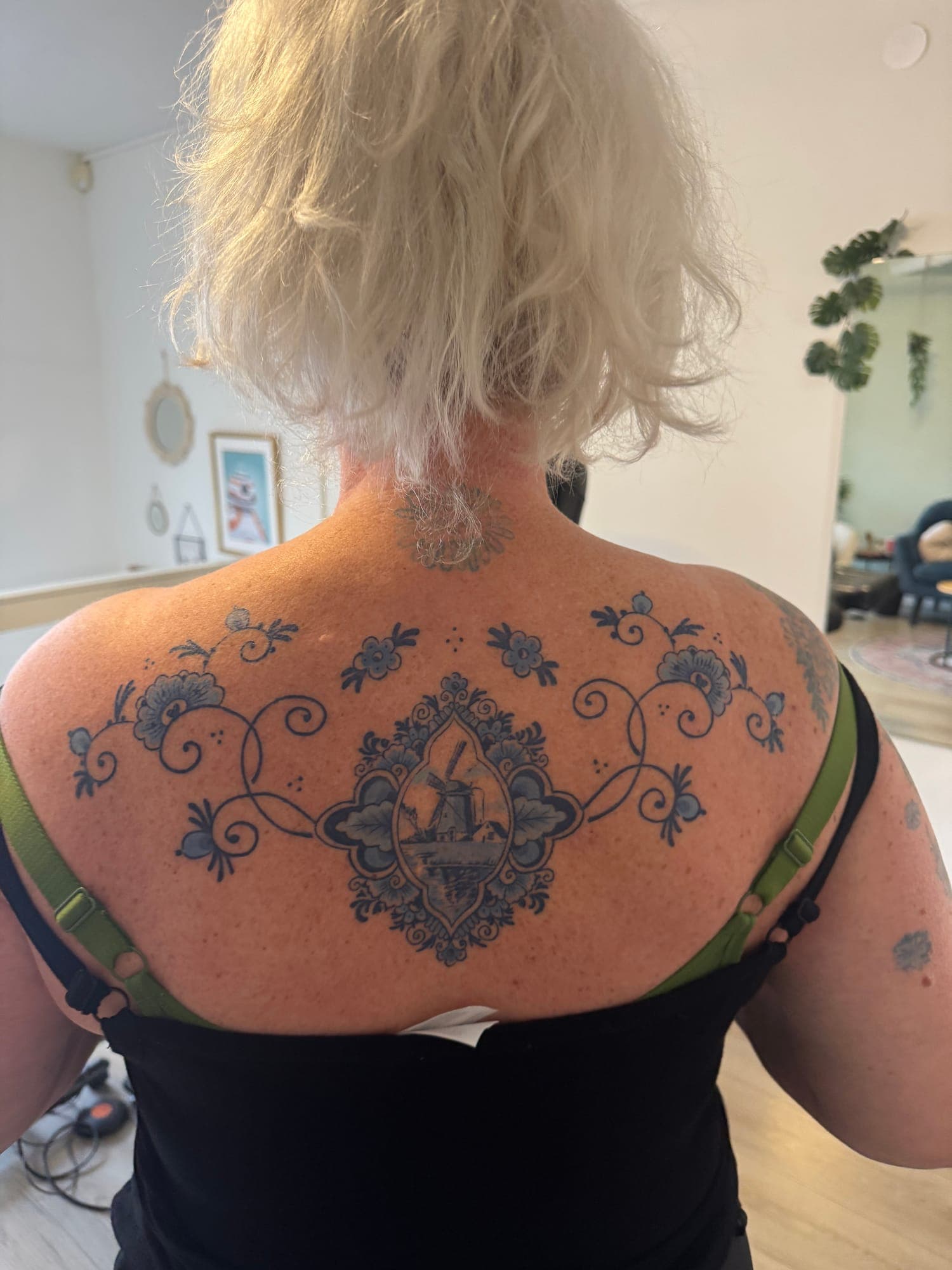 Healed Delft Blue tattoo, ornamental back
