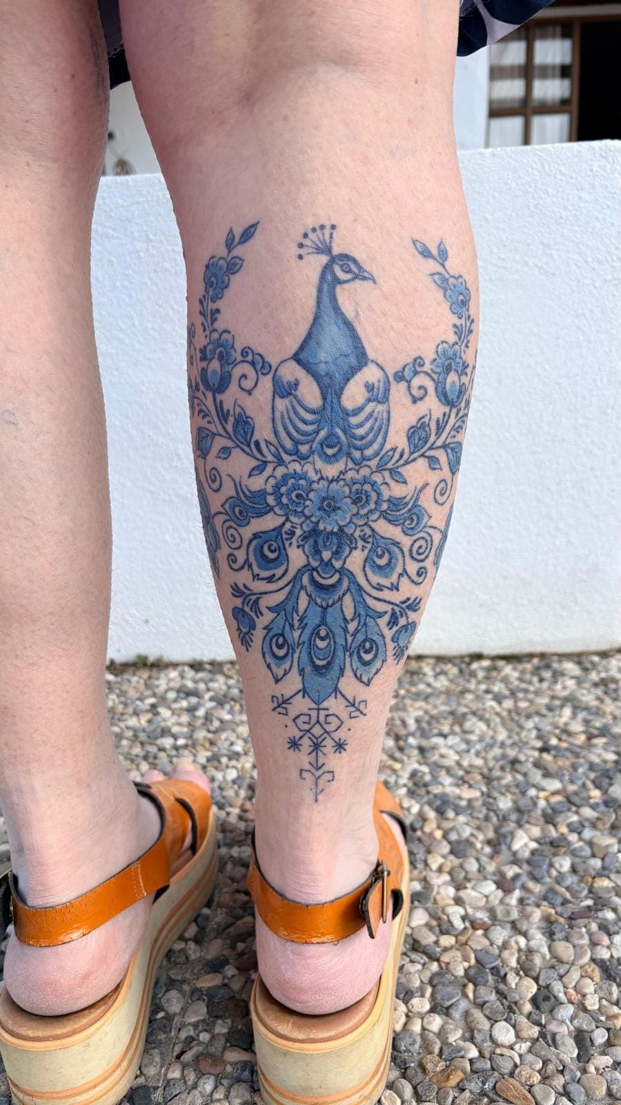 Healed Delft Blue tattoo, ornamental calf