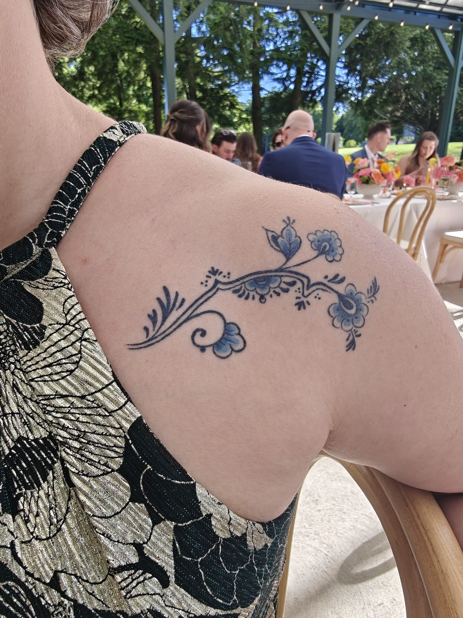 Healed Delft Blue tattoo, ornamental shoulder