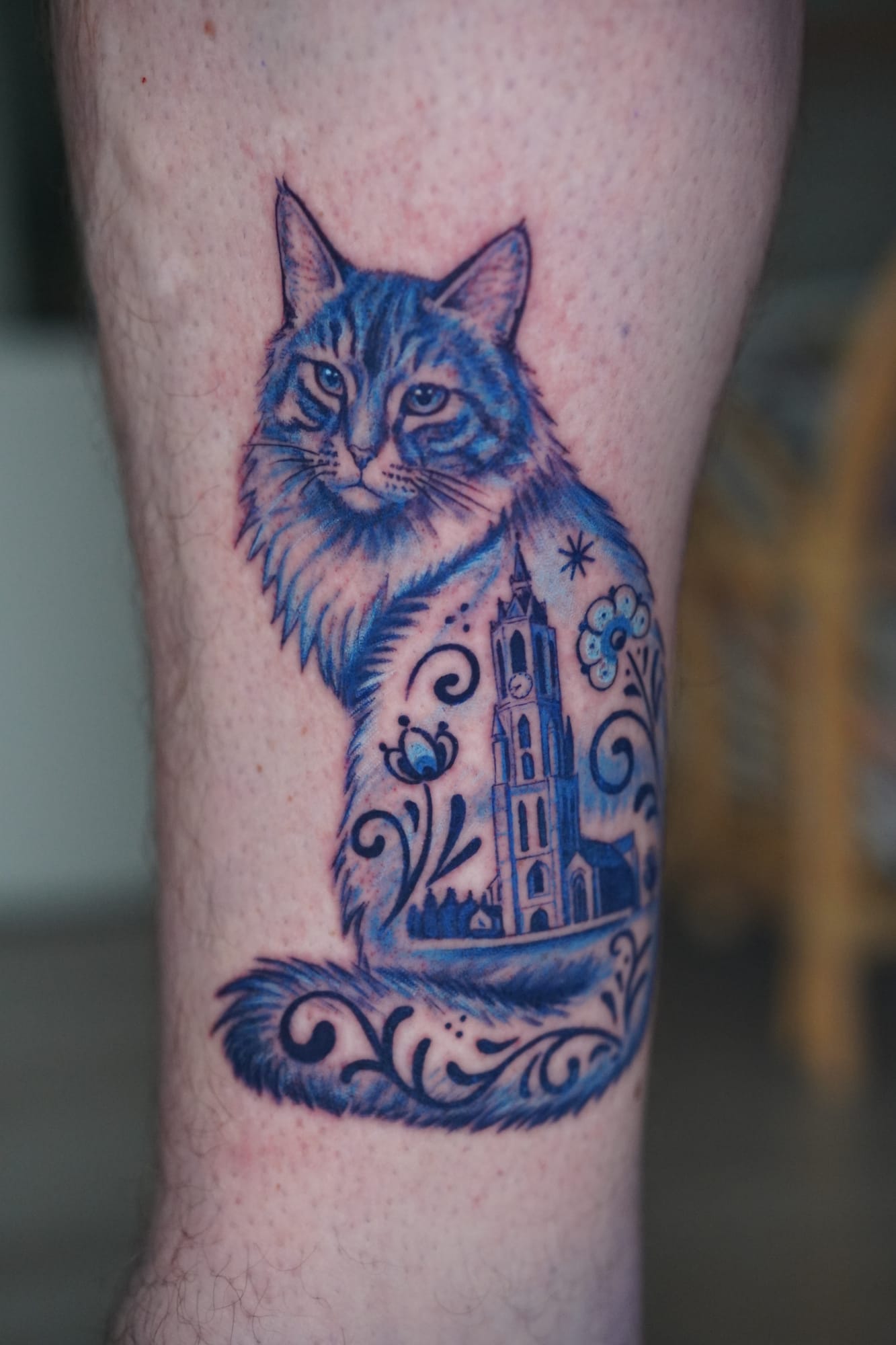 Delft Blue realism tattoo, cat portrait