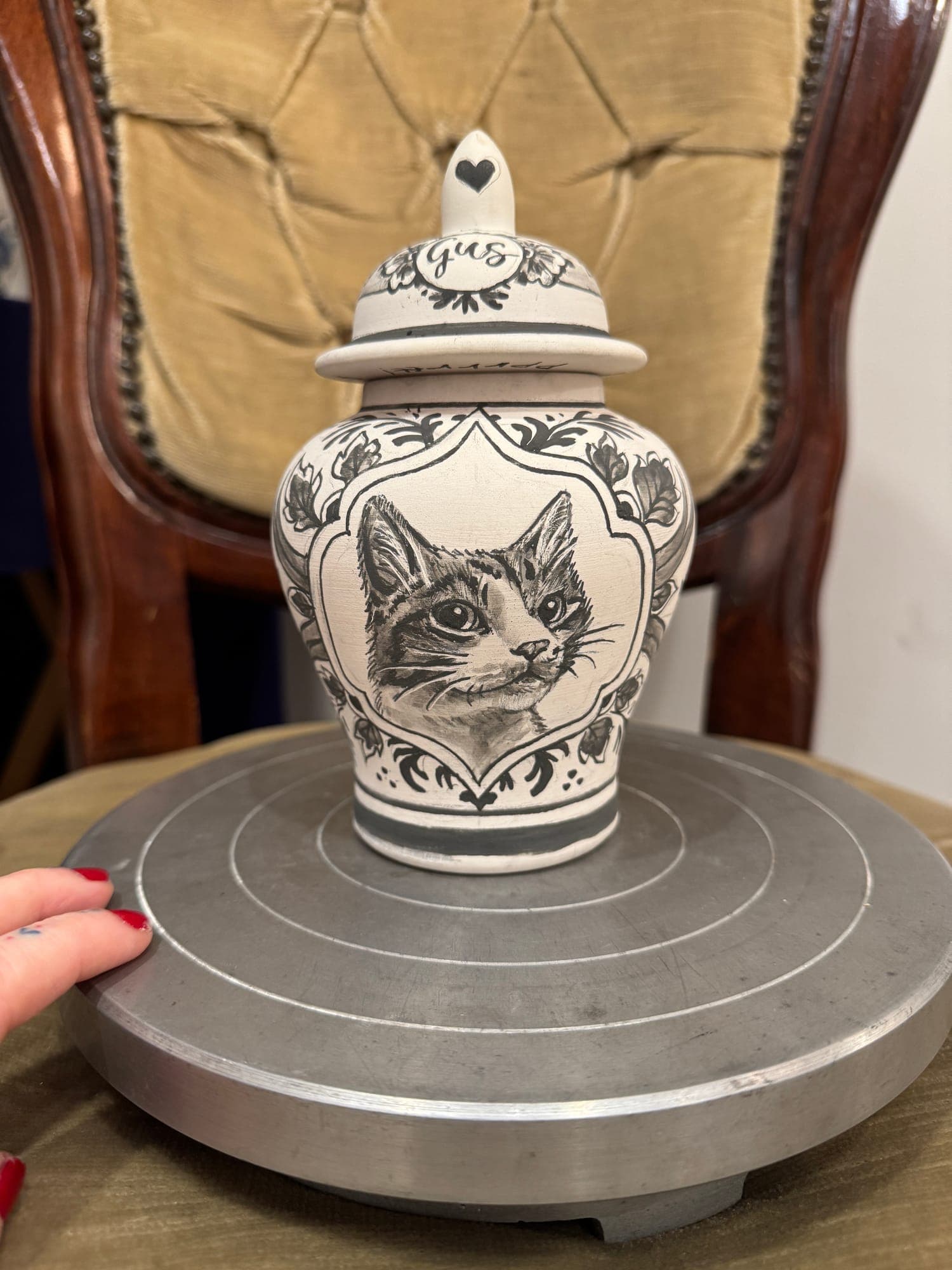 Delft Blue ginger jar with a painted cat